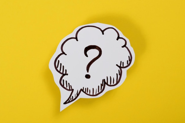 Photo drawn question mark on a yellow background