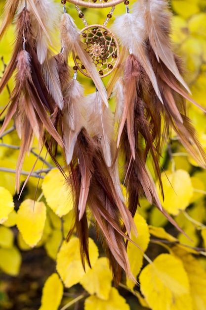 Dream catcher with feathers threads and beads rope hanging. Dreamcatcher handmade