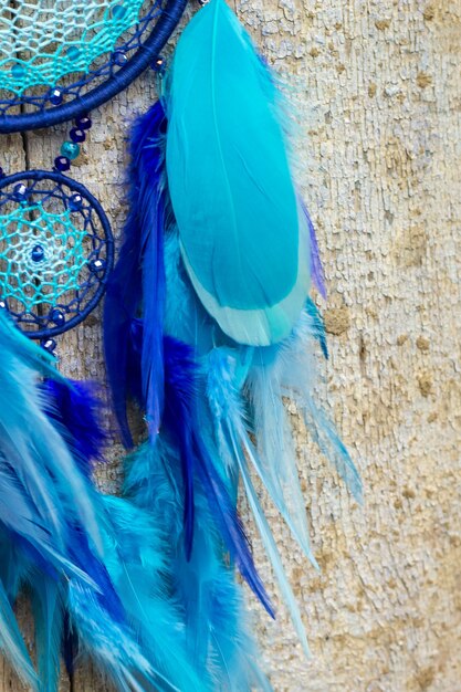 Dream catcher with feathers threads and beads rope hanging. Dreamcatcher handmade