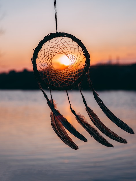 Dreamcatcher sunset ethnic amulet, Indian symbol