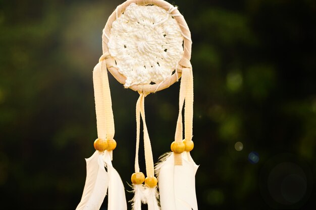 Dreamcatcher with white feather thread and beaded string Handmade DreamcatcherThe light of the set