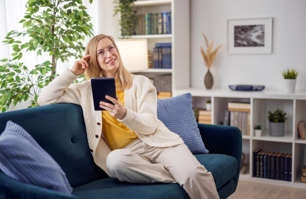 Dreamy caucasian woman in casual clothes