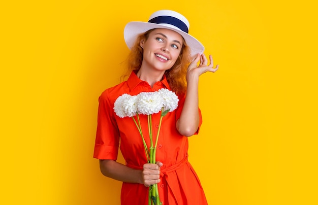 Dreamy girl with mothers day flowers in studio girl with mothers day flowers on background