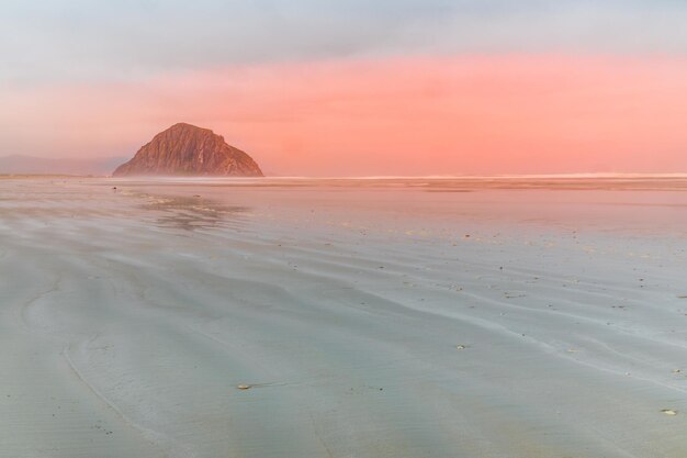 Dreamy morning on the beach of morro bay with the morro rock california