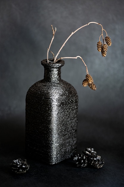 Dreid branch in black square bottle vase