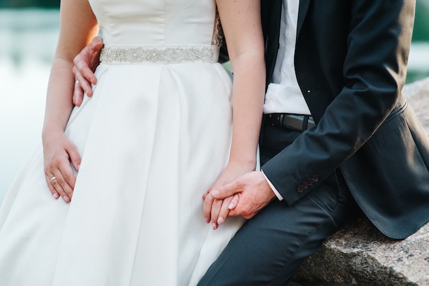 Dress up the bride in a wedding dress with corset and lacing