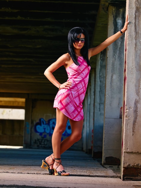 Dressed to impress Portrait of an attractive young woman standing on a street corner