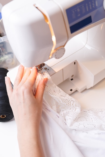 Dressmaker doing lines on sewingmachine