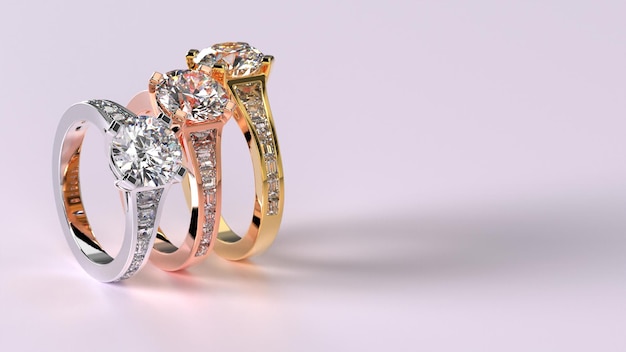 Drie verlovingsringen in rosé goud en zilver platina met baugett zijkanten