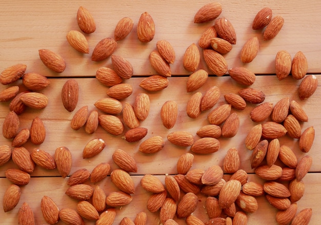 dried almond nut on wood table