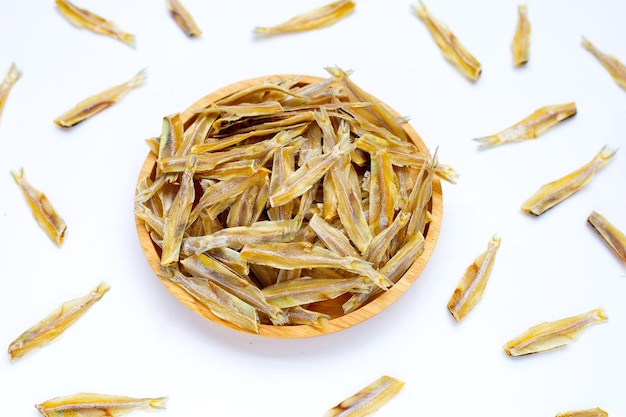 Dried anchovies on white background