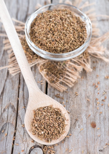 Dried Aniseed on a wooden spoon