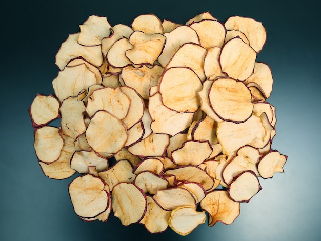 Dried Apple slices on dark