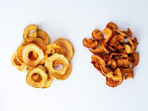 Dried apple slices on white background