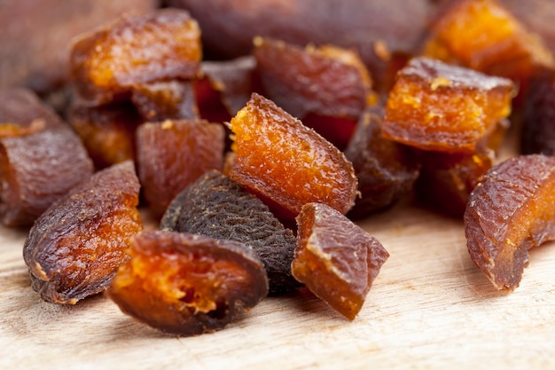Dried apricots dried naturally in the sunlight, dried apricot fruits cut into pieces during cooking