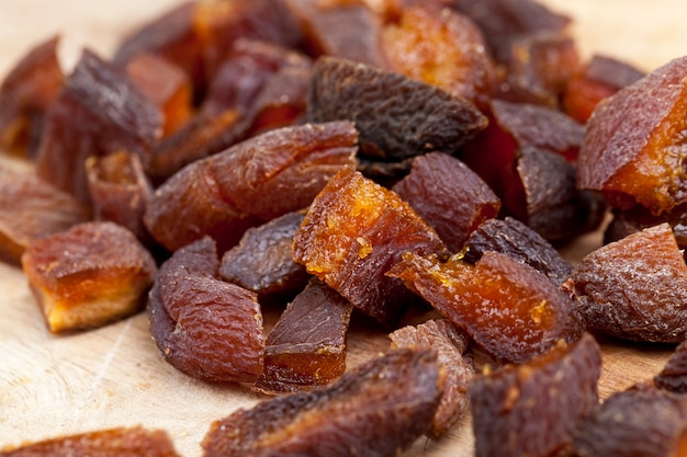 Dried apricots dried naturally in the sunlight, dried apricot fruits cut into pieces during cooking