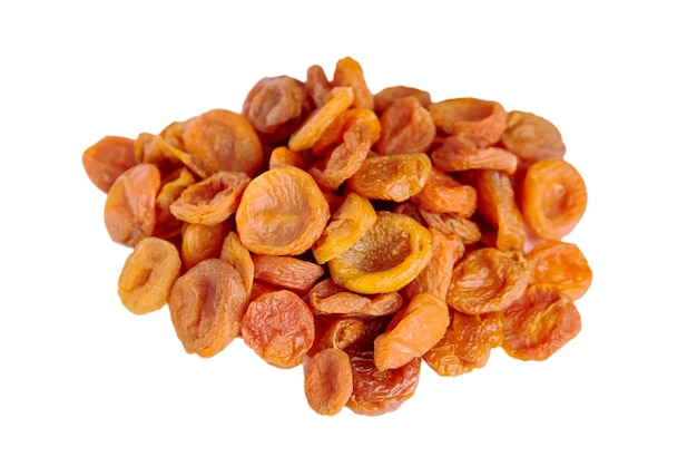 Dried apricots isolated on white background Heap of dry apricot fruits selective focus