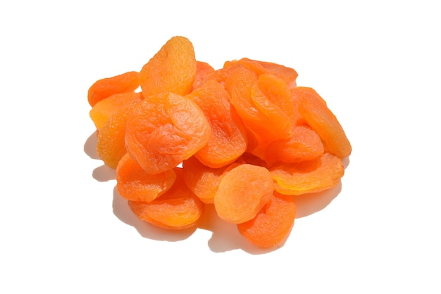 Dried apricots isolated on white surface.