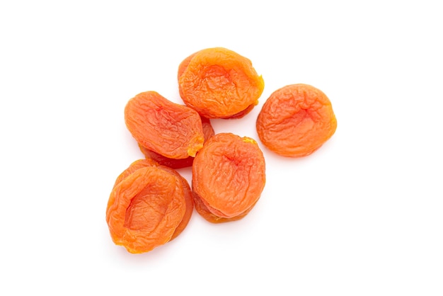 Dried apricots isolated on white, top view