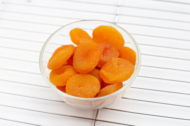 Dried apricots on white background