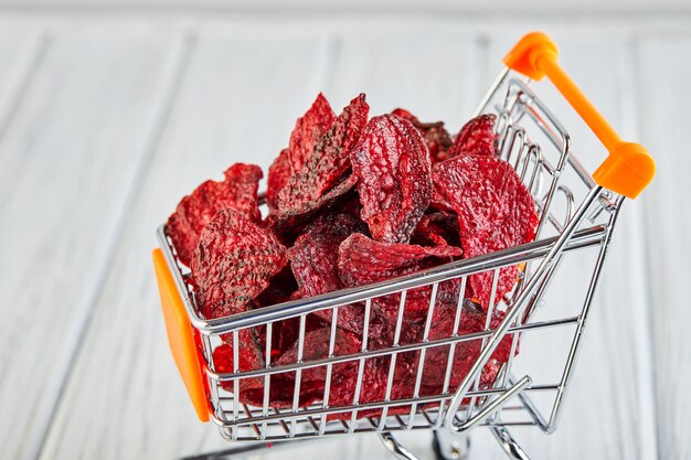 Dried beetrott chips in shopping cart