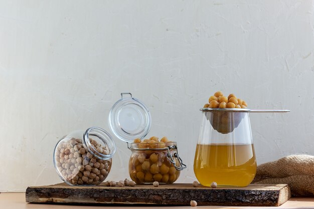 Dried, boiled and aquafaba chickpeas, vegetarian food concept.