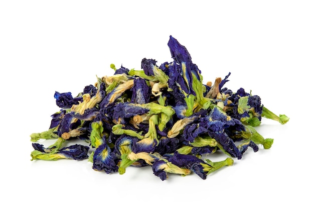 Dried butterfly pea flowers isolated on white. Blue herbal tea