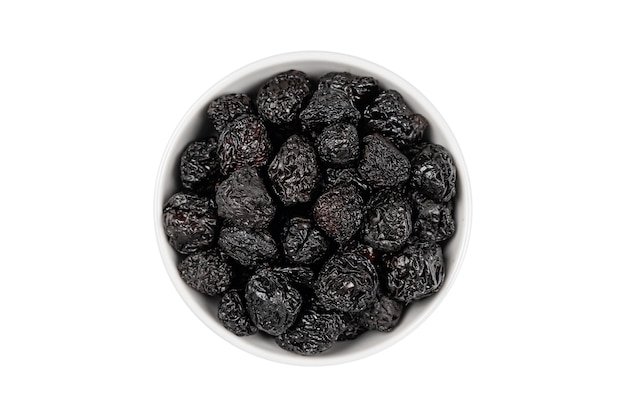 Dried cherry in a bowl on a white background