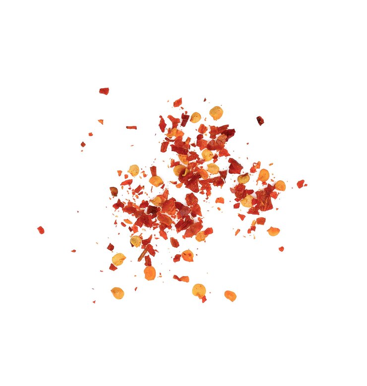 Photo dried chili flakes and seeds isolated on white background, top view