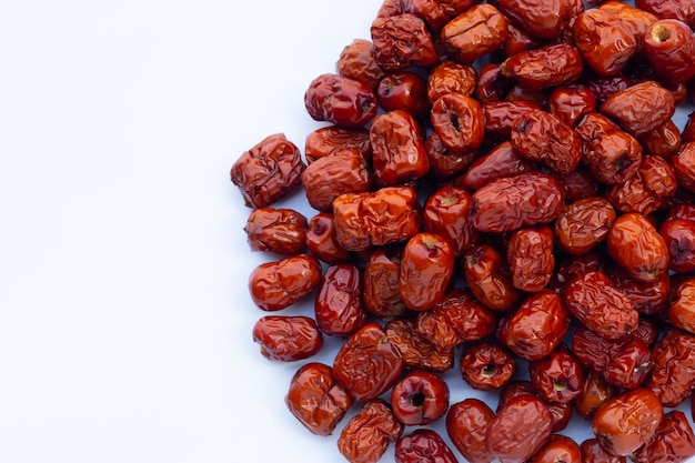 Dried Chinese jujubes isolated on white background.