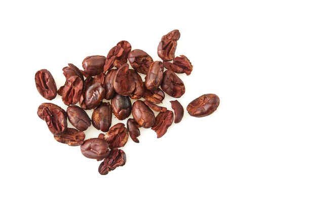 dried cocoa beans isolated on white background