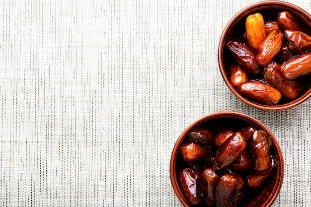 Dried date fruit in bowl.Traditional oriental sweets