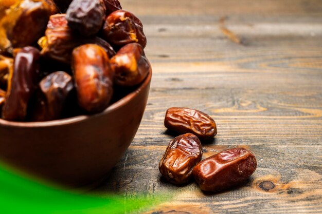 Dried dates fruit for iftar on Ramadan in the bowl