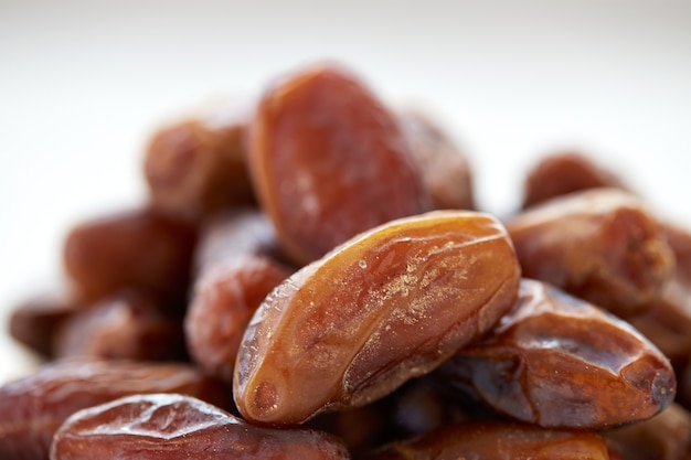 Dried Dates Fruits on dish white background