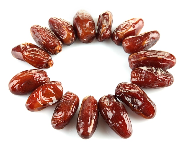 dried dates isolated on white