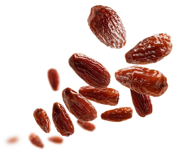 Photo dried dates levitate on a white background