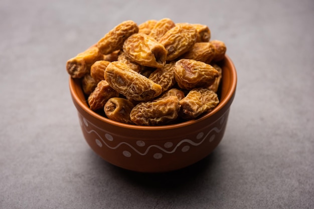 Premium Photo | Dried dates or sukha khajur or khajoor served in a bowl ...