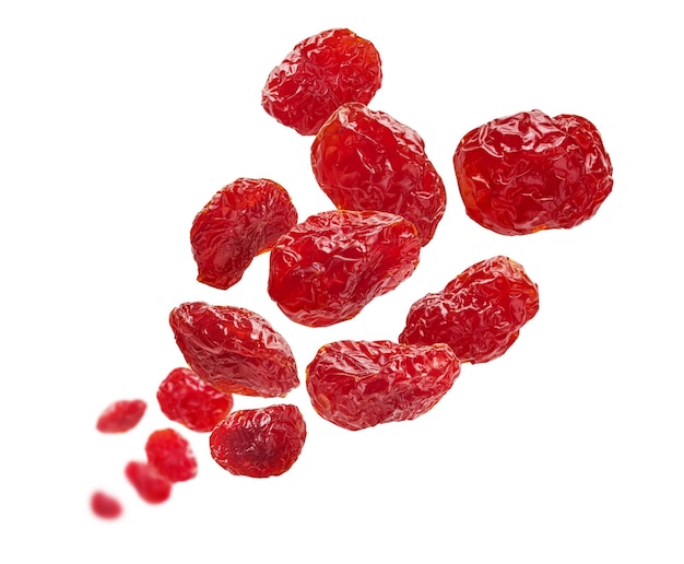 Dried dogwood berries levitate on a white background