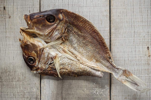 写真 木製の干し魚。