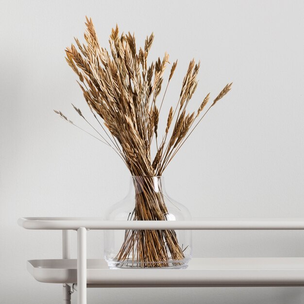 Dried flowers in glass vase