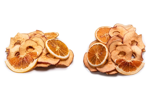 Dried fruit isolated on white.Dried grapefruit, dried apple, dried pear slices.