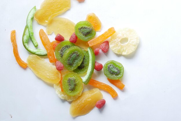 Dried fruits and berries on blue background