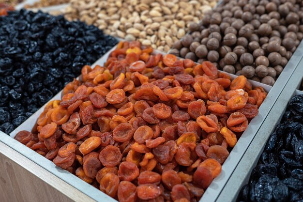 Photo dried fruits and nuts on local food market