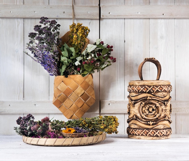 Dried herbs on wooden background. Herbal medicine concept