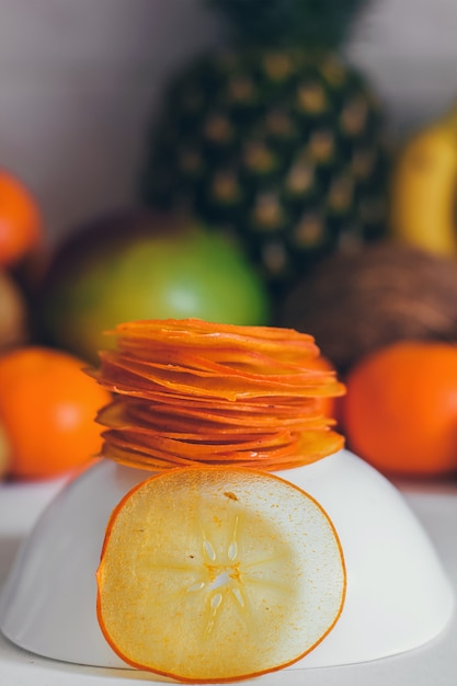 Dried homemade healthy fresh dehydrated slices of Persimmon