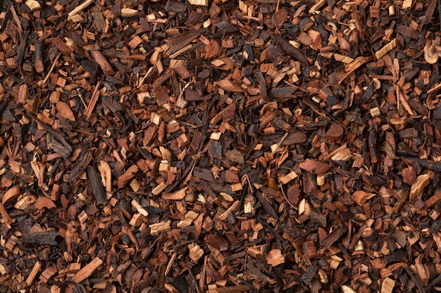 Dried Honeybush tea leaves from South Africa close up full frame