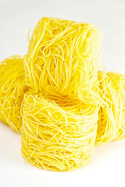 Dried italian pasta on white background