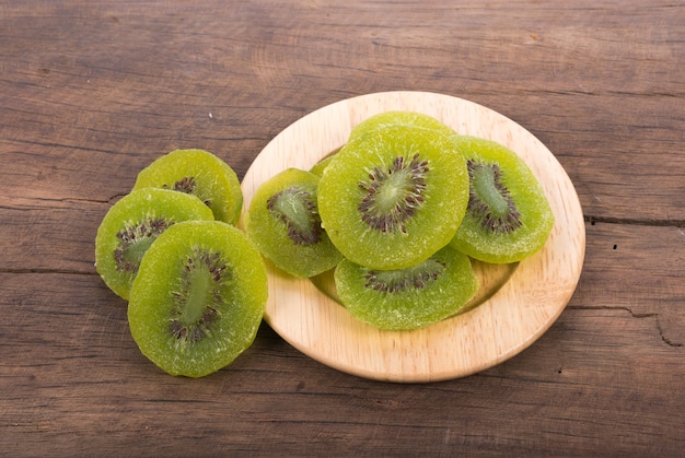 Dried kiwi on wooden background