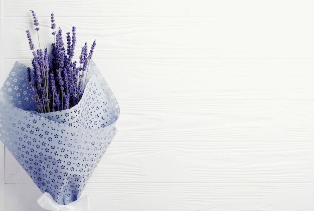 Dried lavender bouquet on a white background. Copy space