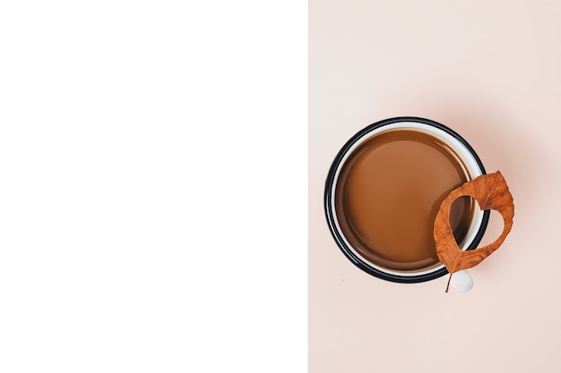 dried leaves, and cup of coffee